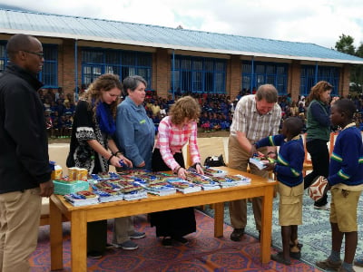 Distributing school supplies at Bisate school